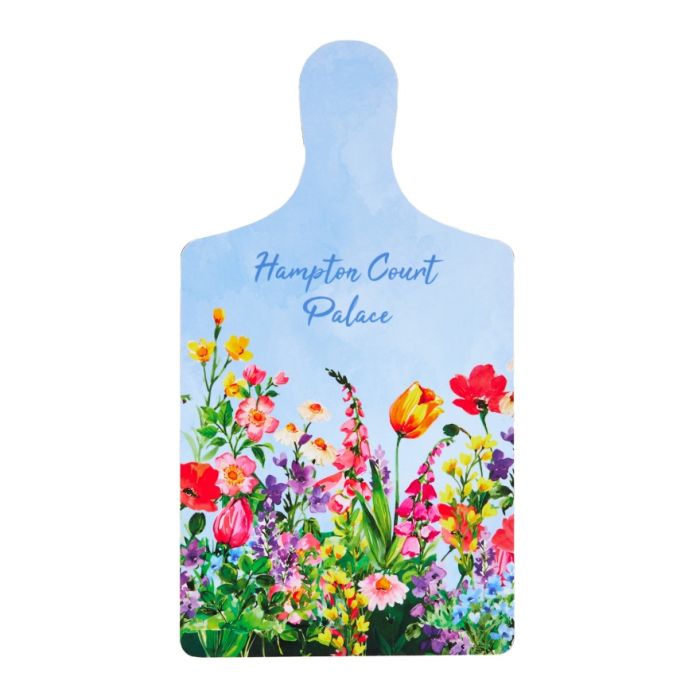A blue chopping board with a handle, featuring a colourful illustration of flowers from Hampton Court Palace.