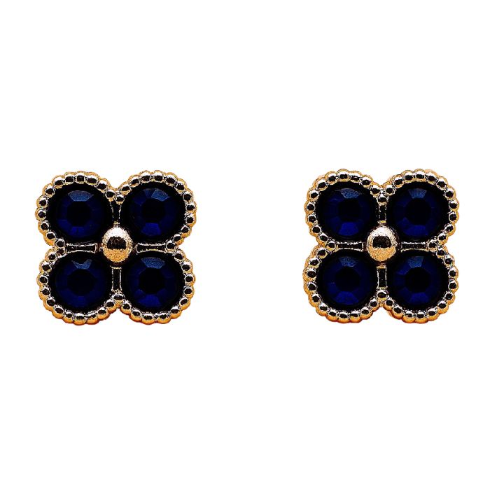 Navy-blue crystal clover-shaped stud earrings mounted in gold-plated metal with a central gold bead.