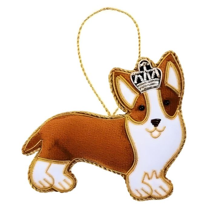 A plush brown fabric hanging decoration of a corgi dog wearing a crown. It is finished in gold and silver thread. 