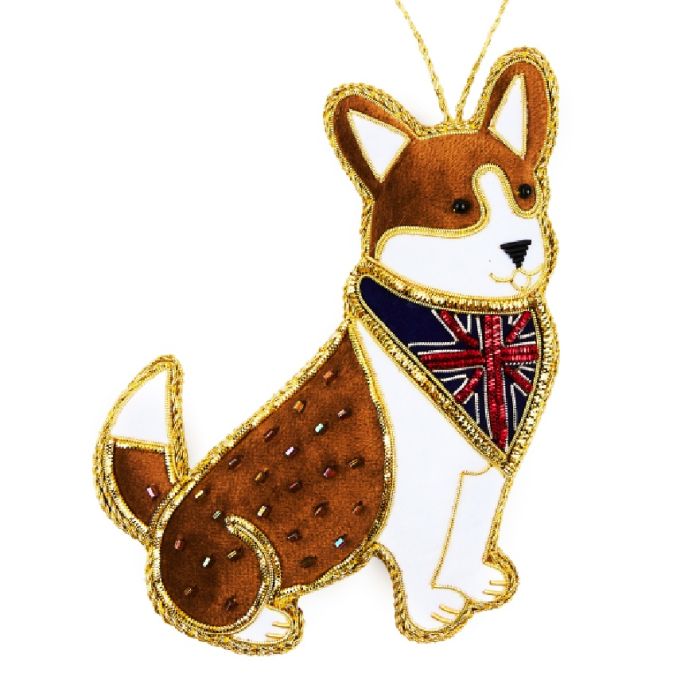 White and brown corgi with a Union Jack neckerchief and a golden threaded outline