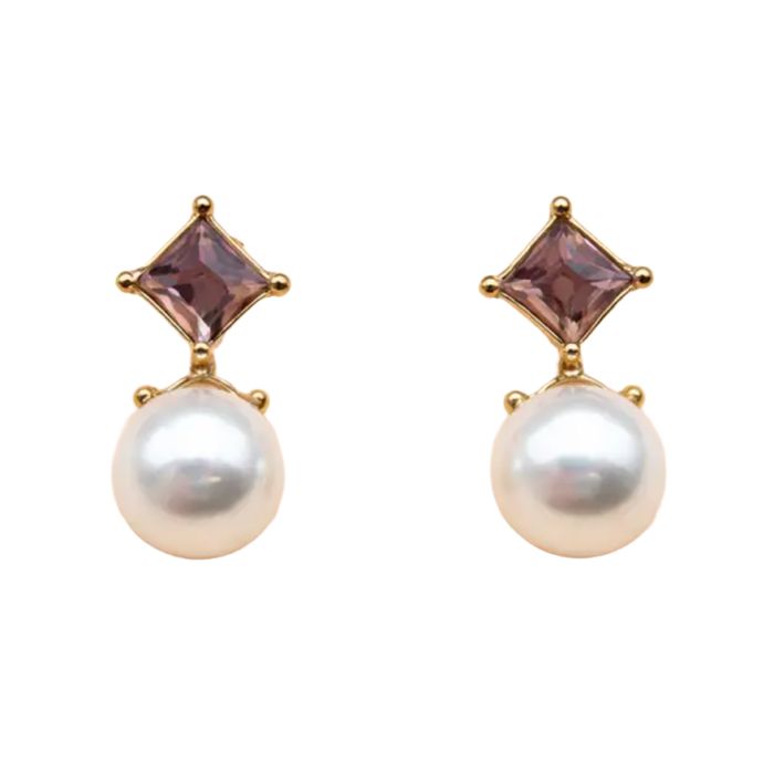  Stud earrings featuring a diamond-shaped purple crystal stud with a hanging round faux-pearl.