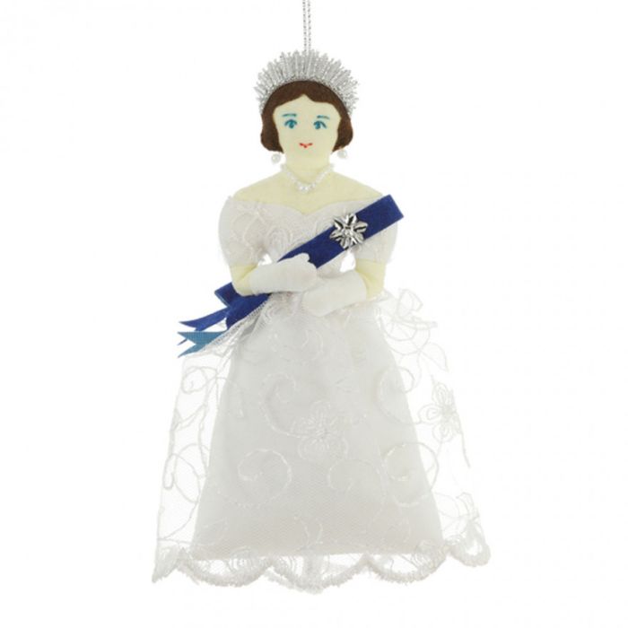 Queen Victoria hanging decoration wearing a white lace dress with blue sash, sparkling tiara and faux pearl earrings.