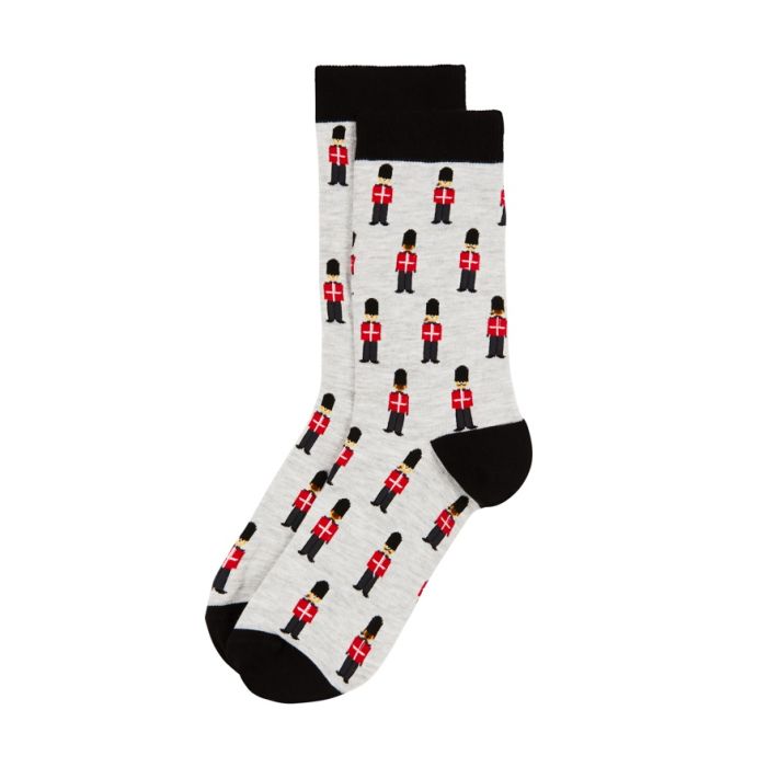 A pair of grey and black socks featuring animated images of the Royal Guards