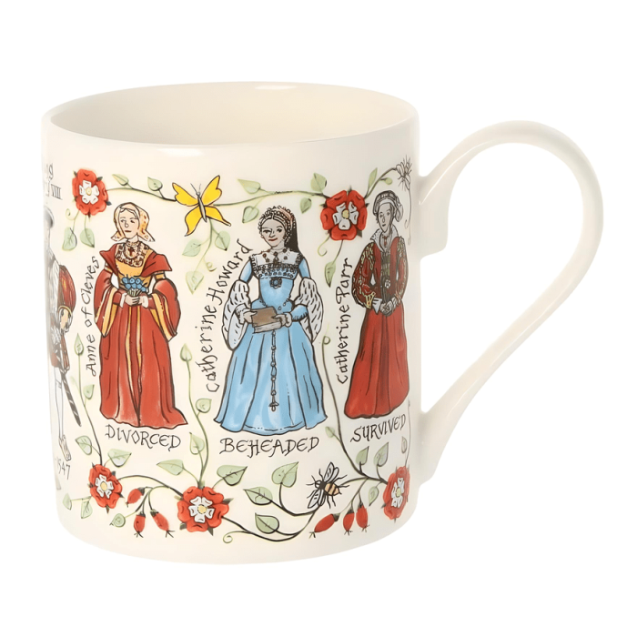 A white mug with colourful illustrations of Henry VIII, his six wives and their children alongside their names and a Tudor rose pattern 