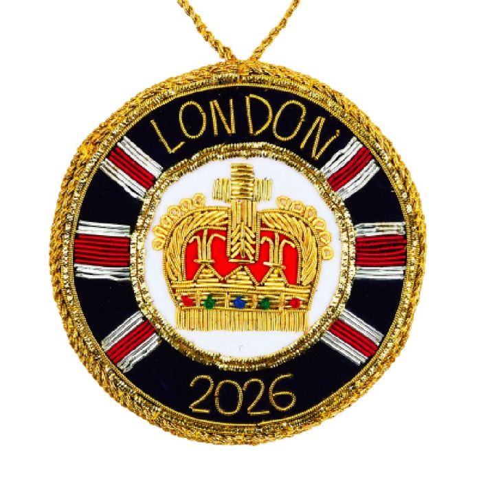 Round ornament featuring a golden embroidered crown and Union Jack details