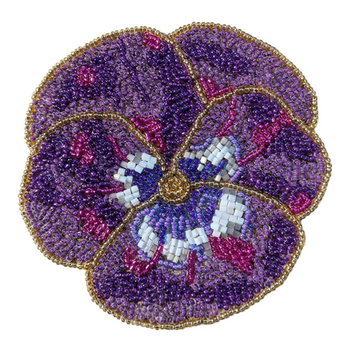 A beaded coaster in the shape of a pansy flower with purple, pink and gold beads. 