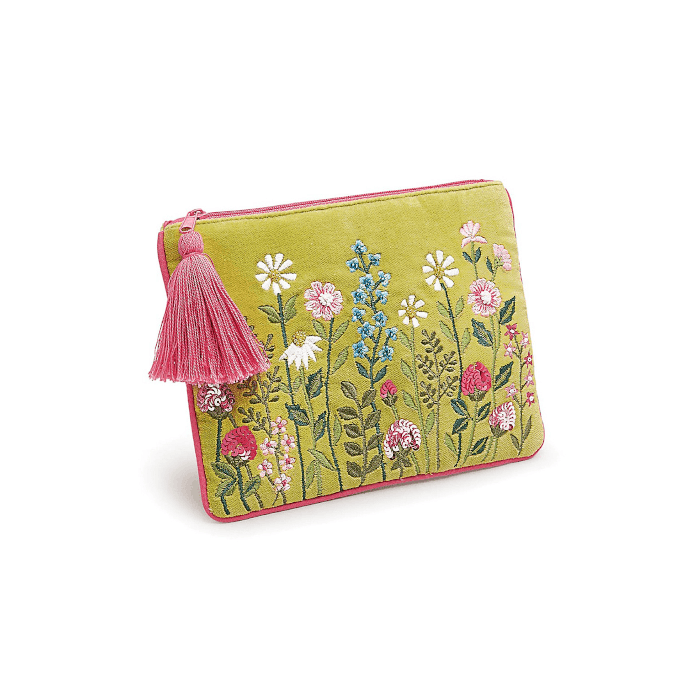 A green velvety purse with embroidered and beaded flowers on  one side. With a contrasting pink zip and tassel.