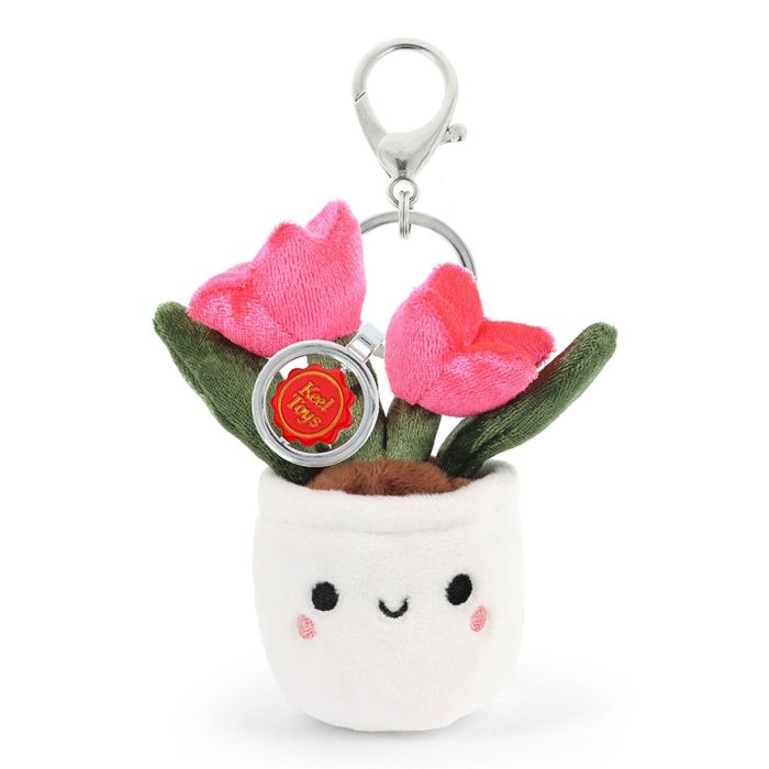 A plush bag charm in the shape of a white flower pot with a pink tulip. I ha an embroidered face and comes attached to a metal carabiner clip. 