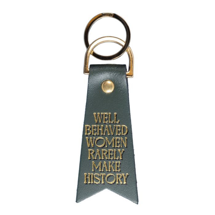 Green leather-look keyring with gold lettering reading “Well-behaved women rarely make history” and gold split ring
